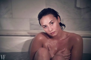 Demi Lovato recently posed for a spontaneous nude, no-makeup photoshoot for Vanity Fair magazine to show readers it's possible to overcome body image issues to feel confident in one's own skin. In a video accompanying the shoot, she says: "It shows other women that you can get to a place where you can overcome obstacles of body image issues and you can feel comfortable and confident in your skin. In the past I suffered from eating disorders and I basically went from hating every single inch of my body to working on myself and trying to figure out ways to love myself and love the skin I’m in."