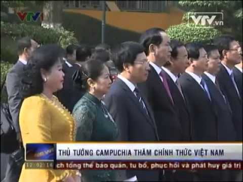 CBN News Hun Sen in Vietnam ពិសេស៖ ល្ងង់ កំពុងរំភើបដោយយួនបញ្ជោរ និងមិនភ្លេចអោនគោរពទង់ជាតិយួន