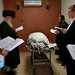 Friends and relatives praying over the body of Aharon Bennett, who was killed in a knife attack, during his funeral on Sunday in Jerusalem.