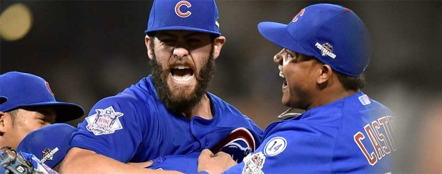Cubs pitcher Jake Arrieta, left, celebrates with shortstop Starlin Castro after defeating the Pirates 4-0, to win the NL wild card game. (Don Wright/AP)
