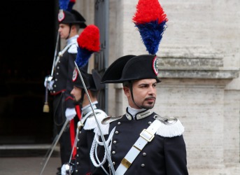 We had just arrived in Rome and on foot from our hotel to the Colosseum when we stumbled upon the preparations for a wedding. The groom was a member of the Carabinieri (Italian Police Force) and his colleagues were forming a guard of honour at the entrance to the church. This photo of an officer with his colourful uniform and impeccably groomed beard will always bring back great memories of this amazing city.