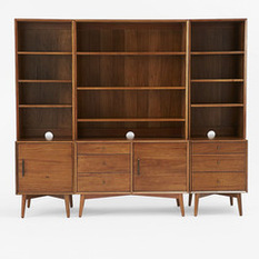 Mid-Century Media 6-Piece Set - Simple, sophisticated storage. Inspired by American modern design, the Mid-Century Media Set borrows its slim legs and beveled edges from iconic '50s and '60s furniture silhouettes. This set offers plenty of shelf, drawer, and cabinet space for all your books and electronics in a streamlined shape that will be the focal point of any living room.