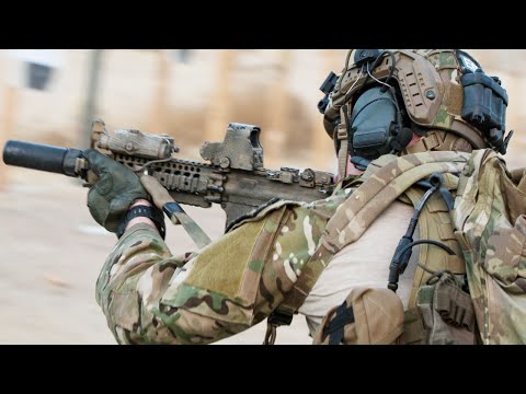 US Special Force in Action During Heavy Close Quarters Combat