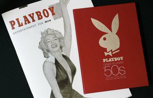 The first issue of Playboy magazine featuring Marilyn Monroe, left, and a boxed DVD set of Playboy magazines from the 1950's are shown in New York on Monday, July 16, 2007.