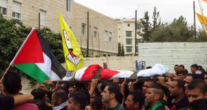 The body of Abed al-Rahman Obeidallah at the funeral march