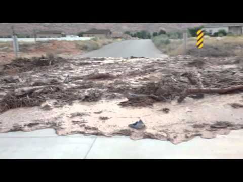 Flash Flood Washes Across Utah Desert Road