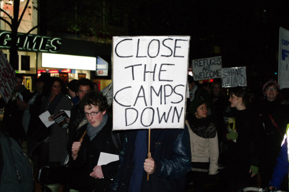 CLose up of placard - Close the Camps Down