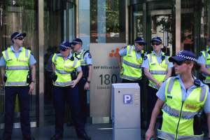 Police at BHP office entrance