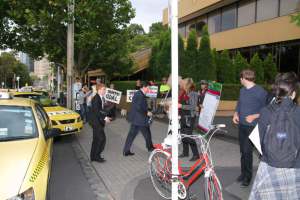 Delegates being handed leaflets after leaving their taxis