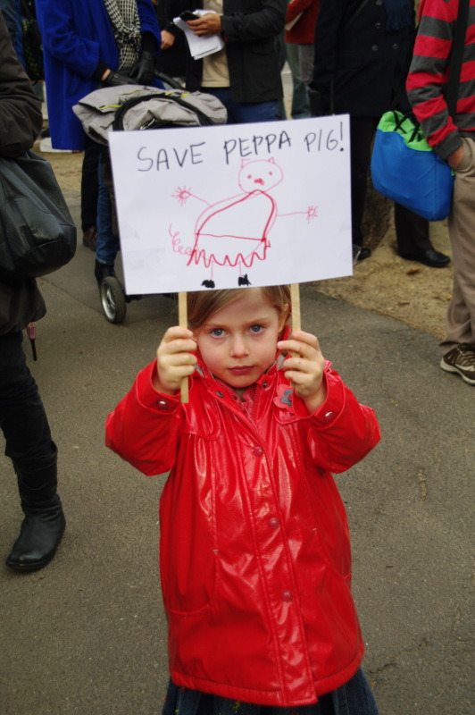 Child with homemade placard - Save Peppa Pig