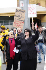 ADL supporters and placards objecting to Halal meat sales at Coles