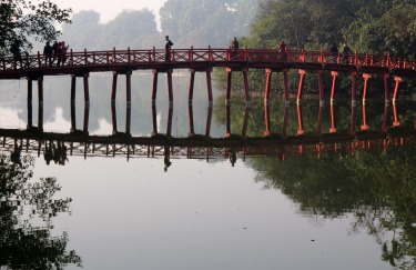 The rewards of rising early - morning light, glassy water and a sprinkling of people on the bridge to Jade Mountain Temple on an island in Hoan Kiem Lake, Hanoi.
Big Picture Sept 12