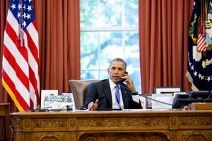 File - President Barack Obama talks on the phone in the Oval Office with South Carolina Gov. Nikki Haley to express sympathy for families affected by the floods and to offer whatever federal assistance is needed to help families recover, Oct. 5, 2015.