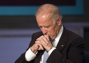 Vice President Joe Biden pauses at George Washington University in Washington, Tuesday, Oct. 20, 2015, during a forum to honor the legacy of former Vice President Walter Mondale.