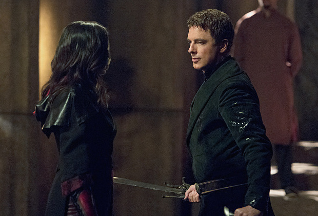 Arrow -- "Restoration" -- Image AR403B_0071b.jpg -- Pictured (L-R): Katrina Law as Nyssa al Ghul and John Barrowman as Malcolm Merlyn -- Photo: Diyah Pera /The CW -- ÃÂ© 2015 The CW Network, LLC. All Rights Reserved.