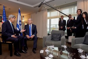 U.S. Secretary of State John Kerry addresses the media before holding a bilateral meeting with Israeli Prime Minister Benjamin Netanyahu at the Grand Sheraton Hotel in Berlin, Germany, on October 22, 2015.