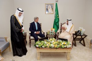 File - U.S. Secretary of State John Kerry sits with King Salman bin Abdulaziz of Saudi Arabia and Deputy Crown Prince and Saudi Foreign Minister Adel al-Jubeir at the Four Seasons Hotel in Washington, D.C., on September 3, 2015, during a bilateral meeting preceding the King's visit with President Barack Obama.