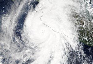 On Oct. 23 at 17:30 UTC (1:30 p.m. EDT) the Moderate Resolution Imaging Spectroradiometer instrument aboard NASA's Terra satellite saw the eastern quadrant of Hurricane Patricia over Mexico and the storm's pinhole eye.