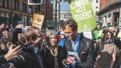 Photos of Protesters Pelting Tories with Eggs at the Party Conference This Weekend