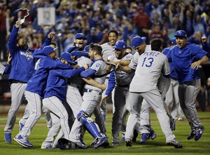 The Kansas City Royals celebrate after Game 5 of the Major League Baseball World Series against the New York Mets Monday, Nov. 2, 2015, in New York. The Royals won 7-2 to win the series.