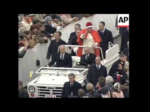 Pope wears Santa style hat at start of general audience