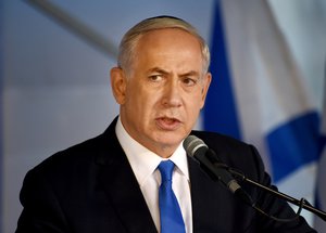 Israeli Prime Minister Benjamin Netanyahu speaks during the official memorial ceremony marking the 20th anniversary of the assassination of the late Prime Minister Yitzhak Rabin in the Mt. Herzl Cemetery in Jerusalem, Israel, Monday, Oct. 26, 2015.