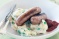 Sausages with pea mash