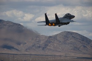 File - An F-15E Strike Eagle assigned to the 389th Fighter Squadron takes off during Red Flag 15-3 at Nellis Air Force Base, Nev., July 21, 2015.