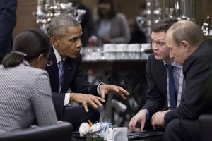 President Barack Obama meets with President Vladimir Putin of Russia on the sidelines of the G20 Summit at Regnum Carya Resort in Antalya, Turkey, Sunday, Nov. 15, 2015. National Security Advisior Susan E. Rice listens at left.