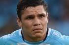 GOLD COAST, AUSTRALIA - MAY 30:  James Roberts of the Titans looks dejected during the round 12 NRL match between the Gold Coast Titans and the South Sydney Rabbitohs at Cbus Super Stadium on May 30, 2015 on the Gold Coast, Australia.  (Photo by Matt Roberts/Getty Images)