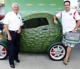 Bobby Allison, left, Grand Marshal for the 2013 SUBWAY Firecracker 250 and Jared Fogel, right, spokesperson for SUBWAY Sandwiches pose with the SUBWAY Avo-car-do at Daytona International Speedway, Friday, July 5, 2013 in Daytona, Fla.