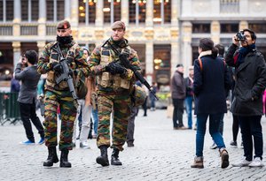 Belgian Army soldiers patrol in the picturesque Grand Place in the center of Brussels on Friday, Nov. 20, 2015.