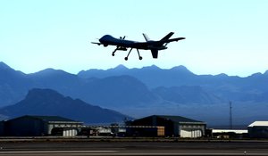 File - An MQ-9 Reaper performs touch-and-go flight patterns June 13, 2014, at Creech Air Force Base, Nevada.