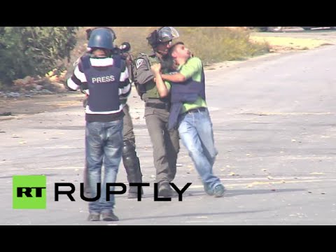 Israeli police run over Palestinian protester, manhandle reporter in Ramallah