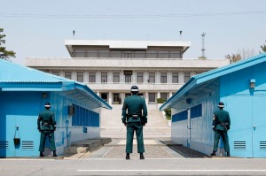 South Korean soldiers stand guard at the Military Demarcation Line in the Demilitarized Zone (DMZ) in the border village of Panmunjom, South Korea.