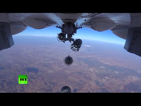 Bombs out: Moment Russian Su-24 drops payload on ISIS in Syria