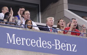 US Open Tennis 2014 - Donald Trump, Melania Trump on Day 1 at the USTA Billie Jean King National Tennis Center in New York, New York - August 25, 2014