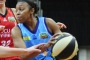 From left, Townsville Fire player Suzy Batkovic and Canberra Capitals player Renee Montgomery in action.