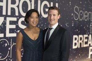 Priscilla Chan and Mark Zuckerberg arrive at the 2nd Annual Breakthrough Prize Award Ceremony at the NASA Ames Research Center on Sunday, Nov. 9, 2014 in Mountain View