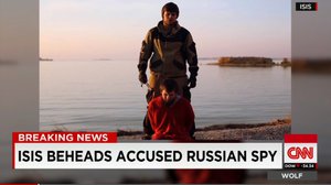 ISIS released video Wednesday from CNN showing the beheading of a man it claims joined the terrorist group but was in fact a Russian spy, as well as a message chastising Russian President Vladimir Putin and threatening his country's citizens.