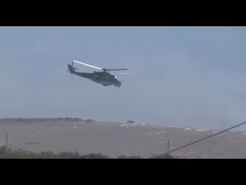 Great footage of Syrian helicopters attacking ISIS positions in Palmyra, Syria