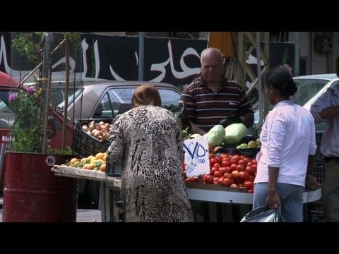 Syria refugee influx taxes Lebanese economy and nerves