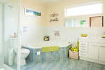 Bright, spacious bathroom complete with corner spa: The Family Shack @ Rye in Rye Ocean Bayside Beaches