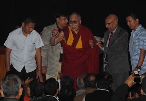 Bhuddhist Monk  Dalai Lama  giving blessings to theaudience after a seminer organised by Presidency University on Tuesday 13 January 2015