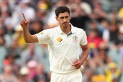 Mitchell Starc shows his discomfort after taking the wicket of Mitchell Santner of New Zealand.