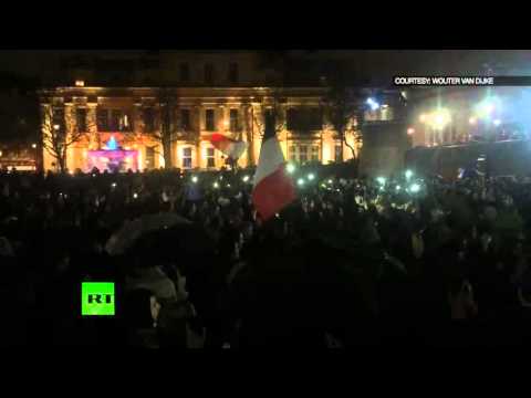 Hundreds sing Marseillaise in London’s Trafalgar Square paying tribute to victims of Paris attacks