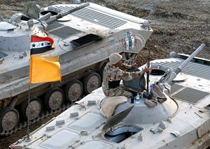 Two New Iraqi Army BMP-1s at Coalition checkpoint in Tarmiya, Iraq, 25 June 2006. The Iraqi Army is an objective counter-insurgency force that has been developed by the government of Iraq from 2003 to 2009 in cooperation with the Multinational force in Iraq, with the majority of the assistance coming from the United States