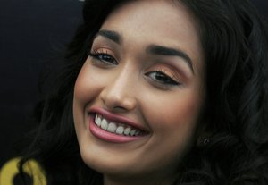 FILE- In this Dec. 19, 2008 file photo, Bollywood actress Jia Khan smiles during a promotional event of her forthcoming Hindi movie 'Ghajini' in Bangalore, India. Police said that Khan was found dead at her home in Mumbai late Monday, June 3, 2013. Khan began her career in Mumbai's film industry in the 2007 Hindi film