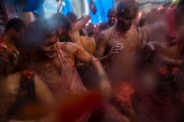 The annual "Tomatina" tomato fight fiesta, in the village of Bunol, 50 kilometers outside Valencia, Spain took place this week. The streets of the eastern Spanish town were awash with red pulp as thousands of people pelted each other with tomatoes in the annual battle that has become a major tourist attraction. At the annual festival trucks dumped 150 tonnes of ripe tomatoes for some 22,000 participants, many from abroad to throw during the hour-long morning festivities.