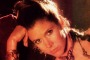 PRINCESS LEIA IN HER GOLD BIKINI FOR NEWS REVIEW
Star Wars / Carrie Fisher 

NO CAPTION INFORMATION PROVIDED